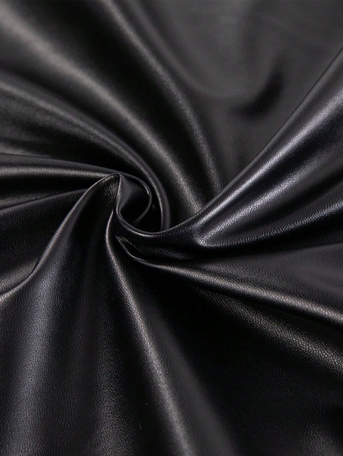 Black leather surface in a tight spiral.